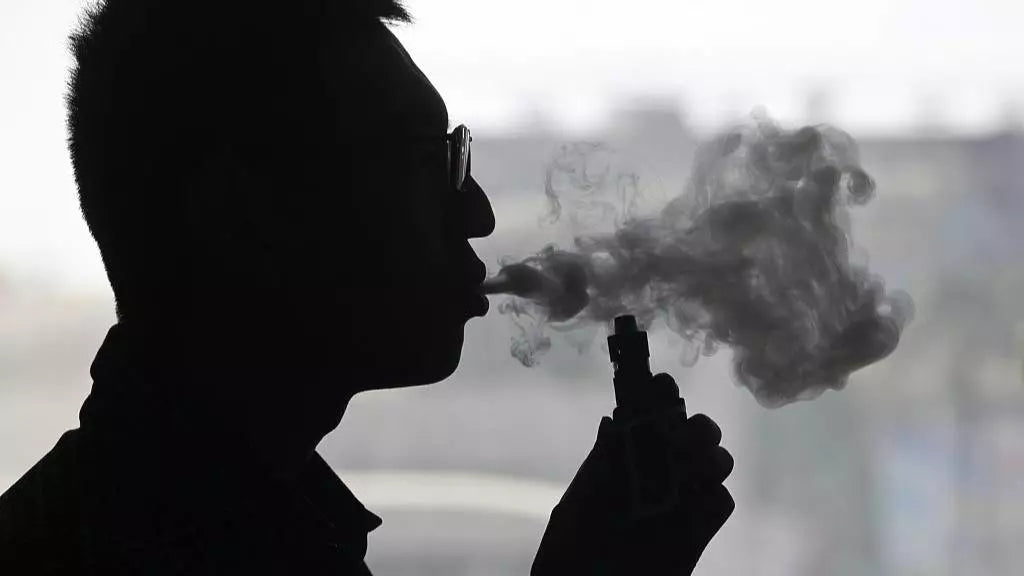 Are e-cigarettes really healthier than traditional cigarettes and more effective in helping people quit smoking?